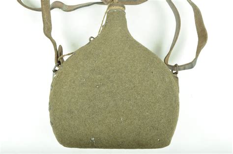 Schéma d'une gourde modèle 1935 avec ses deux sanglons