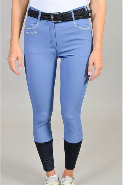 Cavalière en action avec pantalon Harcour