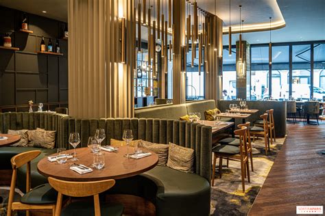 Intérieur d'un restaurant accueillant avec des tables dressées