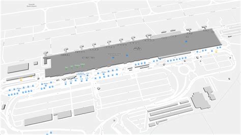 Plan schématique du terminal de l'Aéroport de Tenerife Sud, indiquant les zones d'arrivée, de départ et les commodités