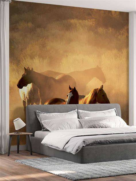 Papier peint panoramique de chevaux au coucher du soleil