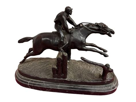 Jockey et cheval d'obstacle