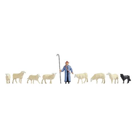 Figurines de moutons et d'un berger en modélisme