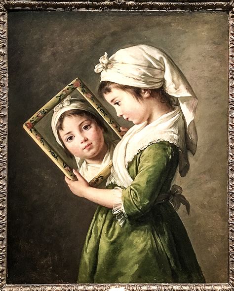 Cheval se regardant dans un miroir