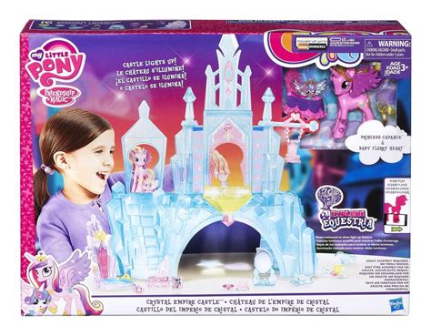 Collection variée de figurines Petit Poney, incluant des éléments de l'Empire de Cristal