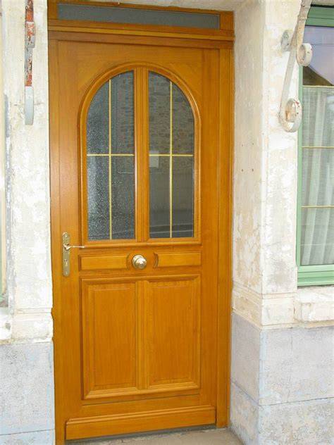 Porte d'entrée avec petits bois laiton
