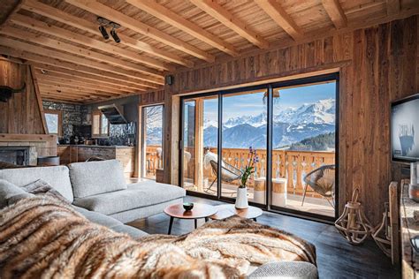 Photo d'un chalet de montagne confortable avec vue