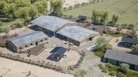 Vue d'ensemble d'un ranch avec une écurie